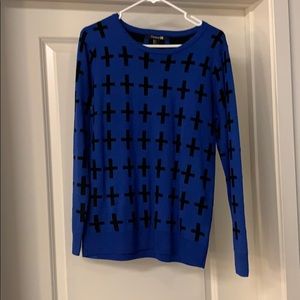 Blue and black cross sweater